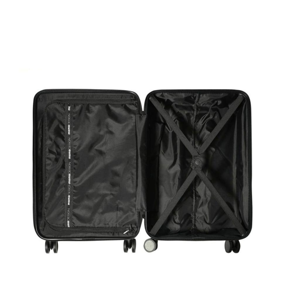 Trolley nero aperto con vano interno e organizer, vista dall'alto con due valigie
