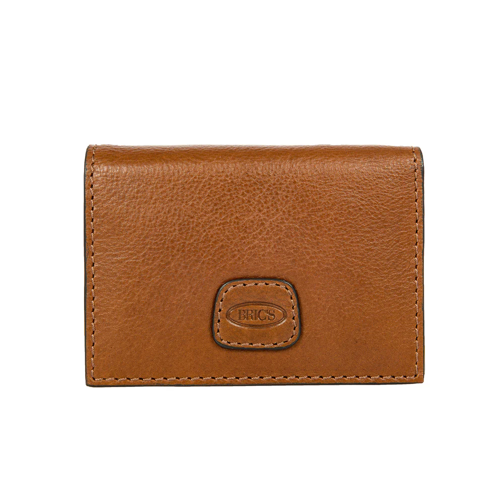 BRIC'S VOLTERRA PORTACARTE TOBACCO Portacarte in pelle marrone, vista frontale con logo Bric's